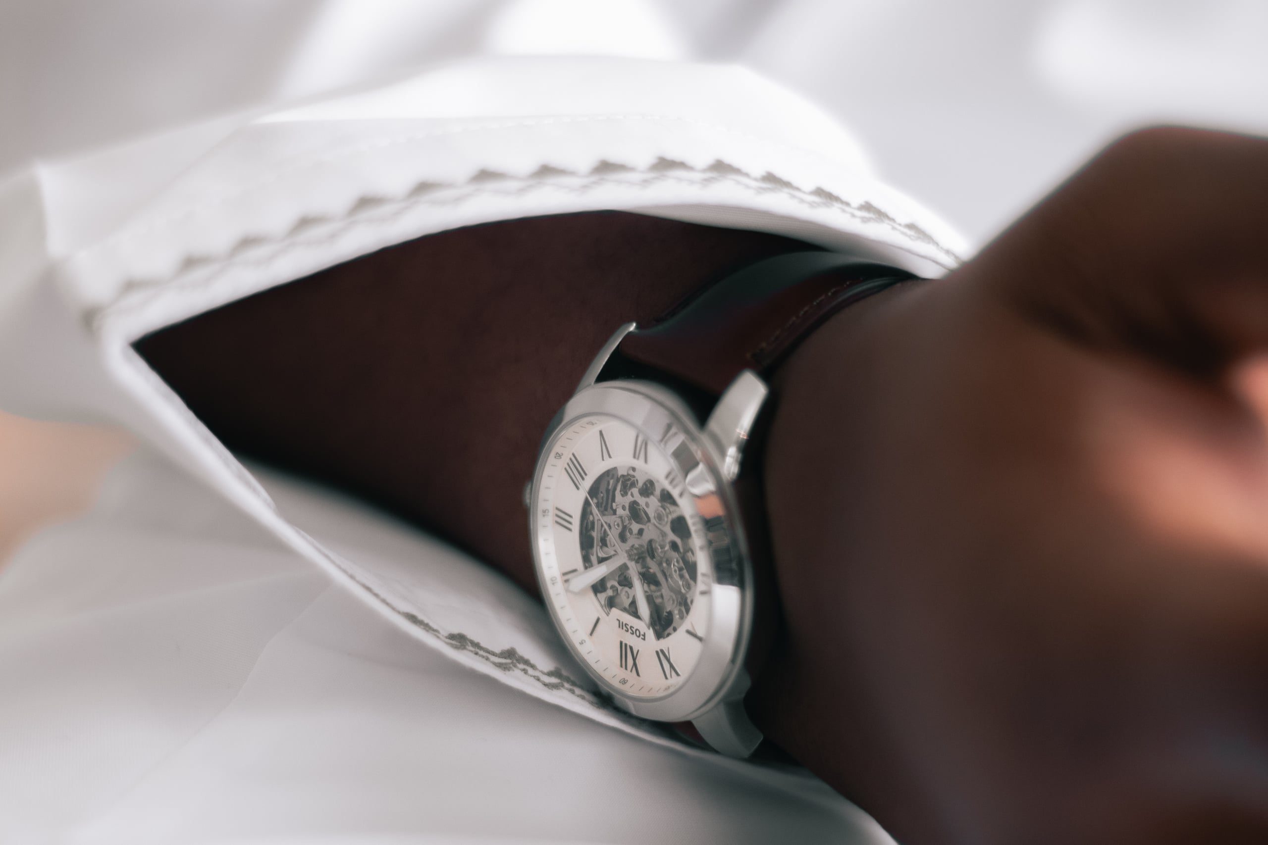 Wedding detail, watch on wrist